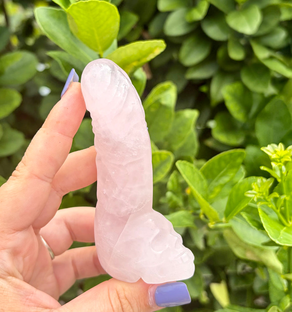 Rose quartz skull with ding