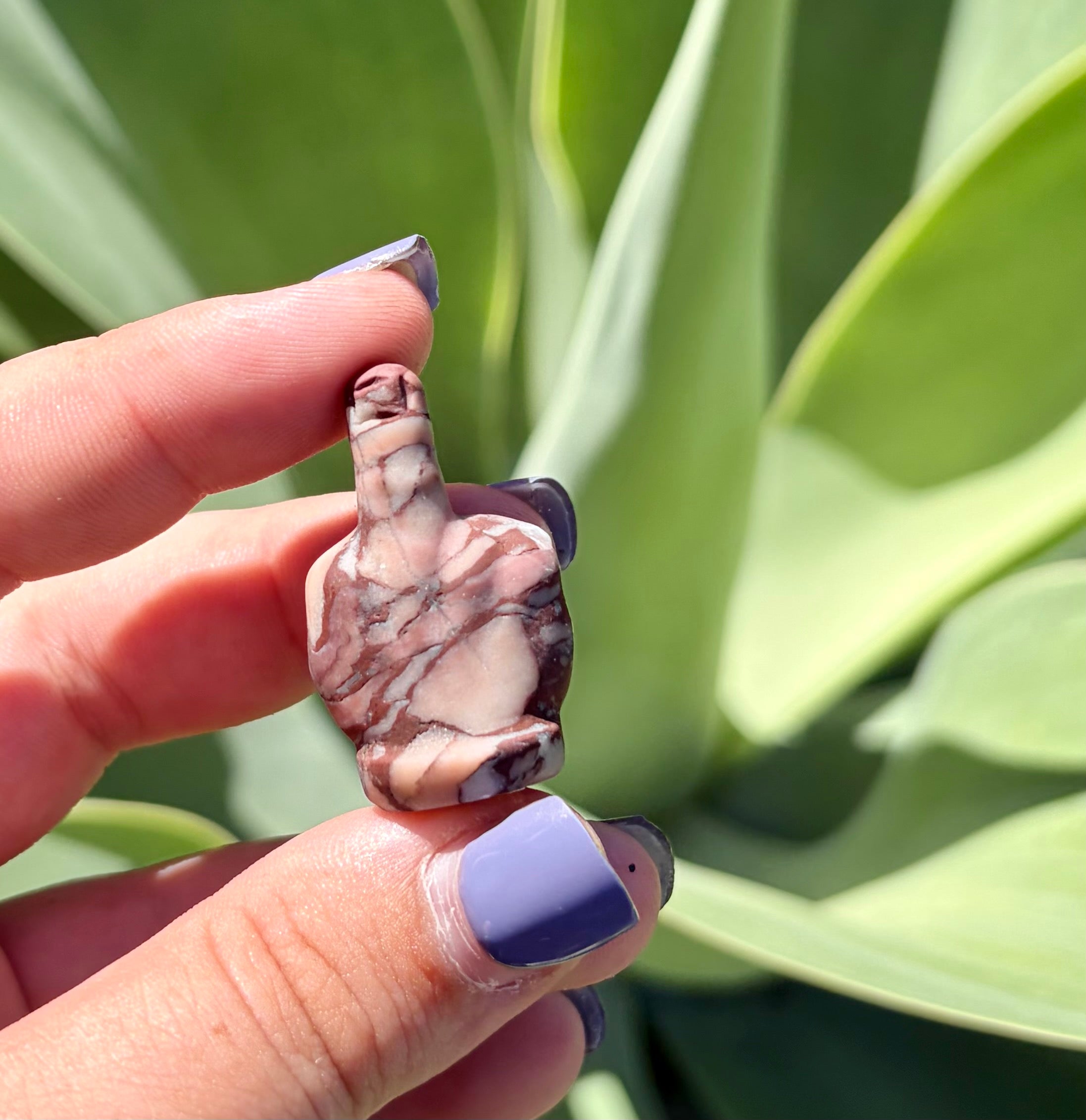 Chocolate calcite middle finger